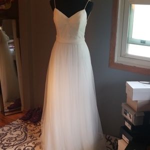 Never worn/altered wedding dress